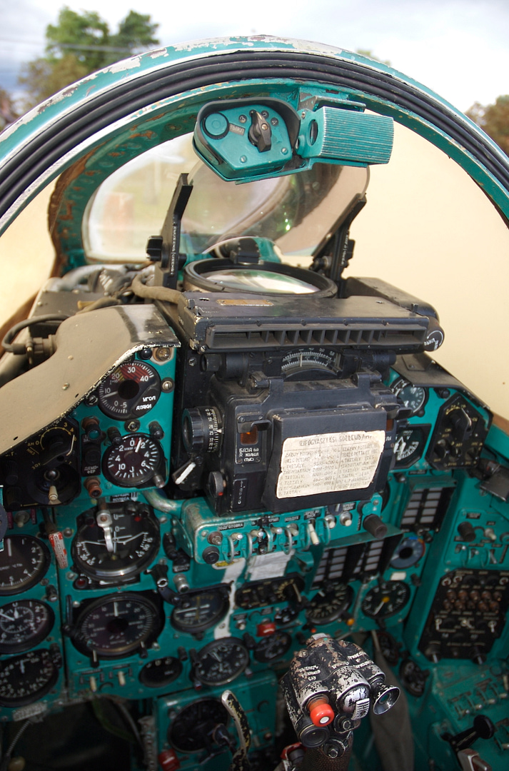 The MiG-23MF cockpit analog instruments and the Sapfir-23 radar controls of an early Flogger.