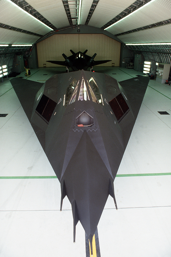 Two 37th Tactical Fighter Wing F-117s in a hangar during Operation Desert Shield, weeks before the 1991 air war.