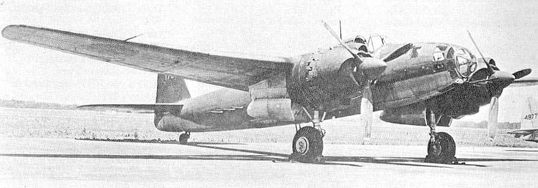 Rear three-quarter view of a P1Y Ginga, single-fin tail and tapered wing.