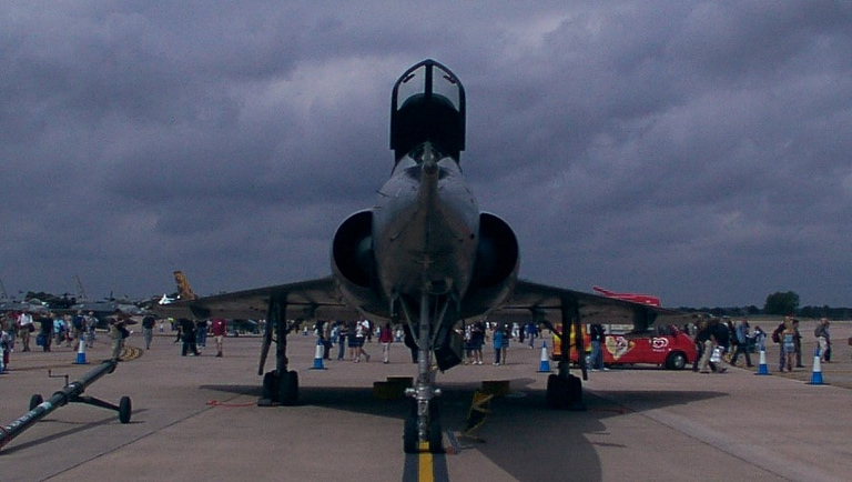 A French Air Force Mirage IV on static display, its scale and delta wing clear on the ground.