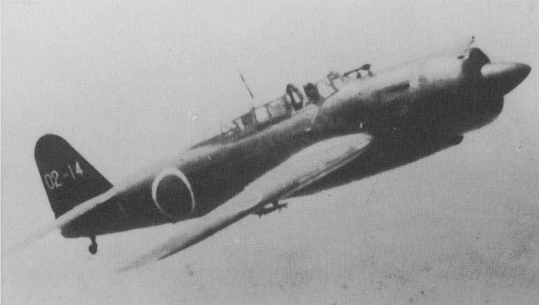 A D4Y3 Suisei pulling up in flight, showing the clean lines of the Comet.