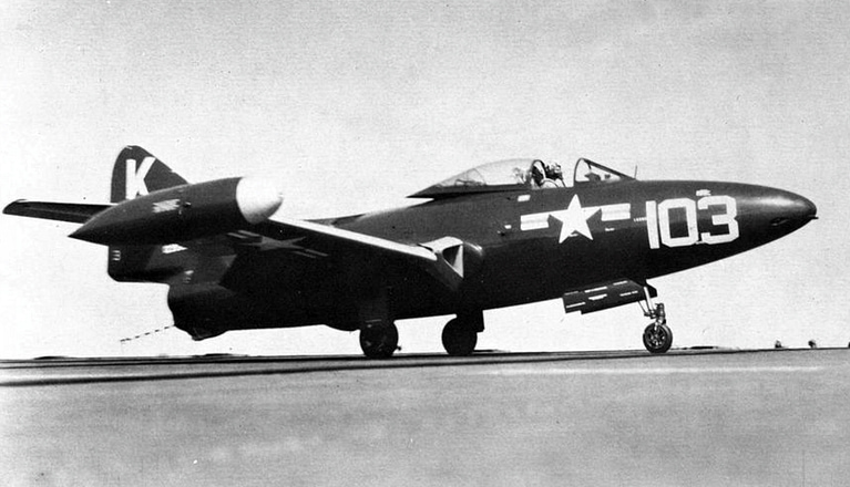 A VF-31 F9F-2 Panther recovers aboard USS Leyte off Korea, around 1950.