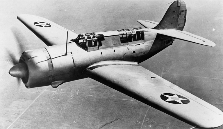 A Curtiss SB2C Helldiver on the ground with wings spread