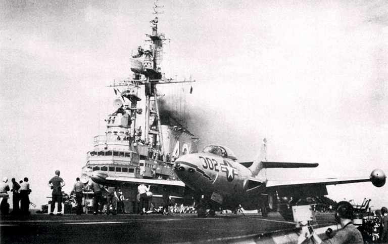 A VF-83 F9F-5 Panther hooked to the catapult of USS Coral Sea, 1953.