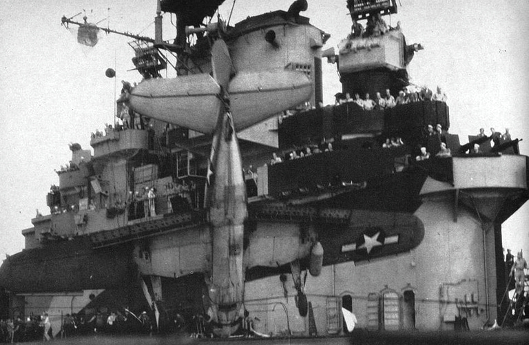A Curtiss SB2C Helldiver caught in the arrester wires on a carrier
