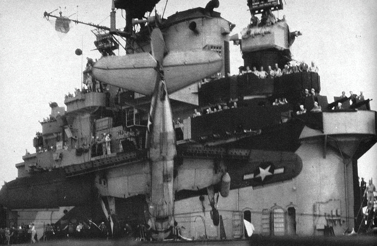 A Curtiss SB2C Helldiver caught in the arrester wires on a carrier