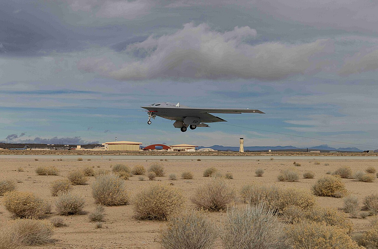 B-21 Raider flying over the desert during testing at Edwards Air Force Base