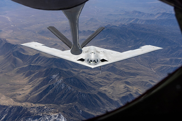 B-21 Raider conducting aerial refueling behind a KC-135 tanker