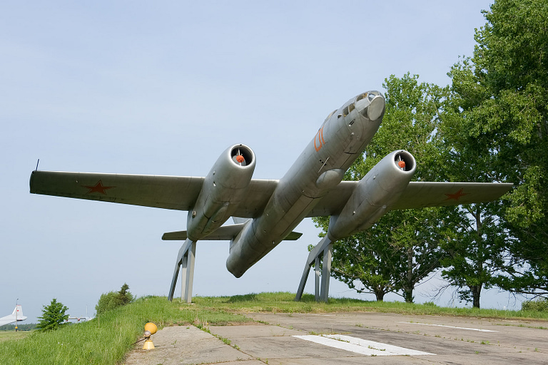 A preserved Il-28 Beagle mounted for display, its glazed nose clearly visible.