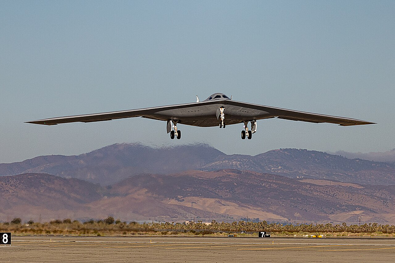 B-21 Raider taking off with landing gear down at Edwards Air Force Base
