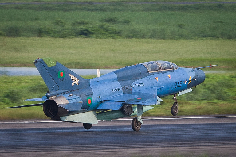 A two-seat FT-7 trainer touching down the export version of the JJ-7.