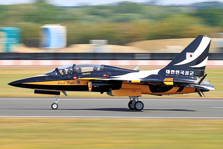 The ROKAF Black Eagles fly the aerobatic T-50B in their black-and-gold livery.