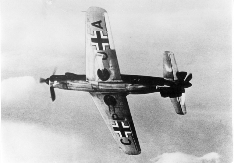 A Dornier Do 335 in German markings on a wartime airfield