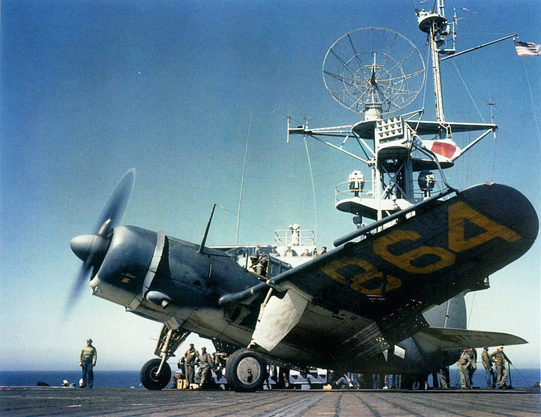 A Curtiss SB2C Helldiver running up on a carrier flight deck