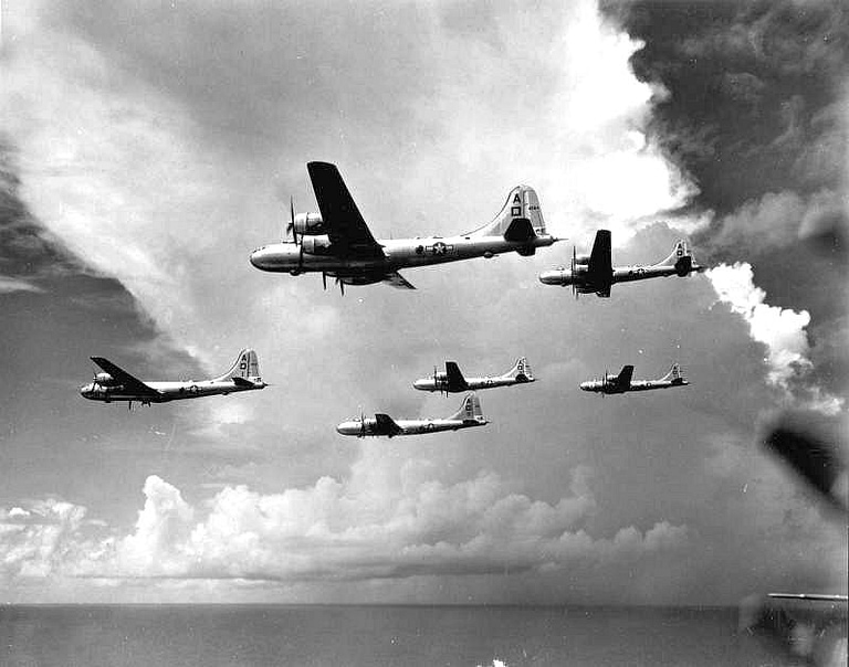 B-29s of the 497th Bomb Group in formation, 1945 massed high-altitude bombing was the types original doctrine.