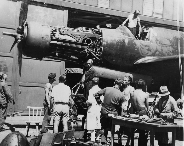 Ground crew working around the nose of a Dornier Do 335