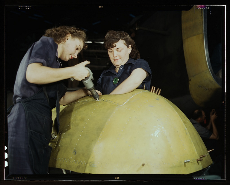 Worker assembling a Vengeance dive bomber at Vultee, 1942