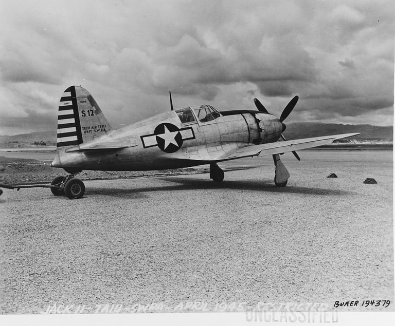 A captured Mitsubishi J2M Raiden examined by US forces