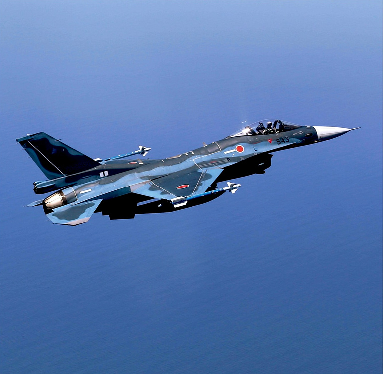 A lone F-2 over the sea in its ocean-blue maritime camouflage the colours of its anti-ship mission.