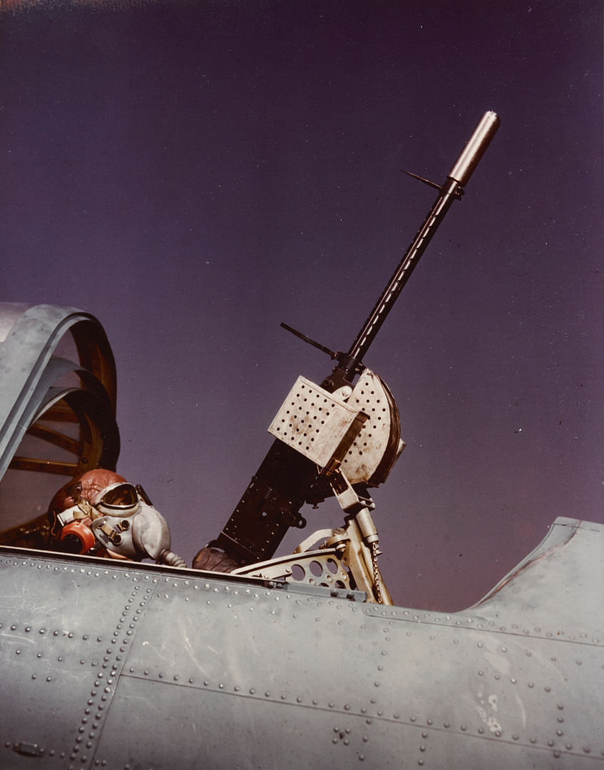 The radioman-gunner mans his flexible rear machine guns, around 1942.