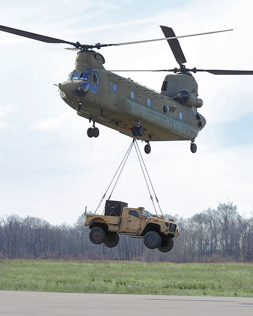 CH-47 Chinook lifting a vehicle as an external sling load