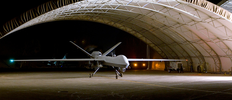 A remotely piloted MQ-9 taxis from its hangar at Joint Base Balad, Iraq.