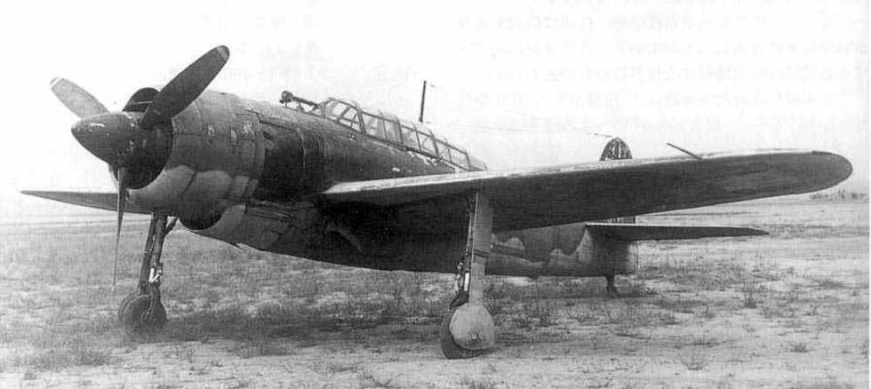 A D4Y3 Suisei airframe photographed on the ground after capture.