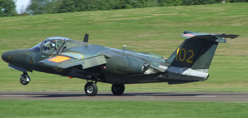 A Swedish Sk 60 in camouflage, showing the wide side-by-side cockpit.