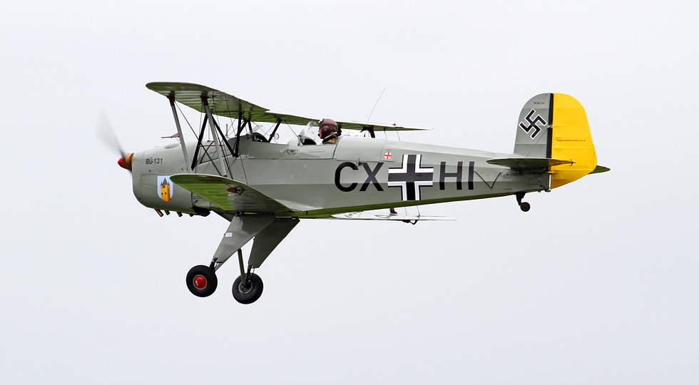 A Jungmann warbird in authentic 1930s German trainer markings.