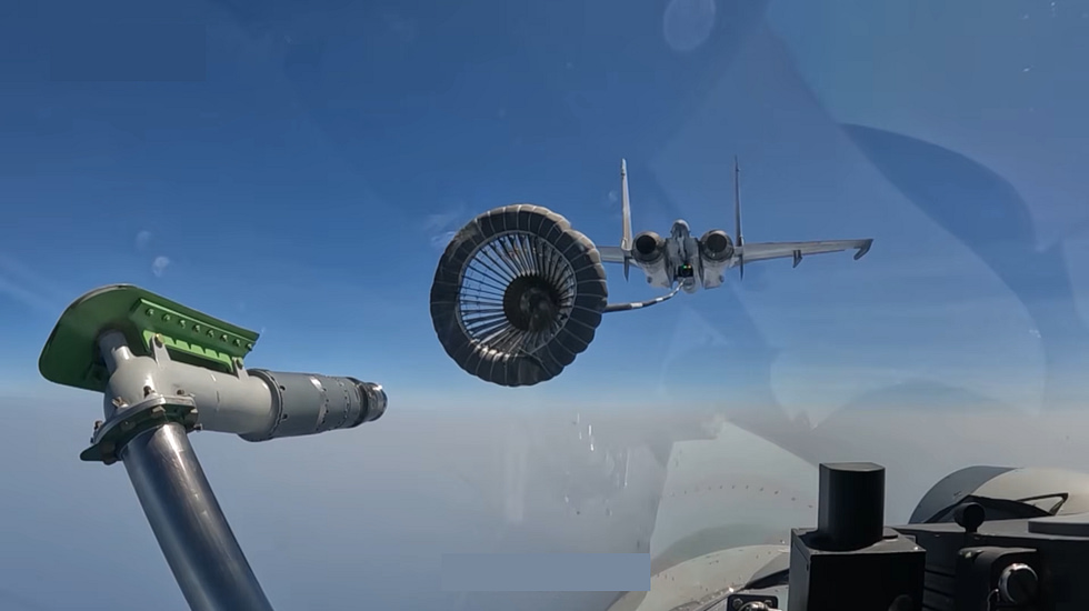 A J-15 tanking in flight buddy aerial refuelling extends the naval Flankers reach.