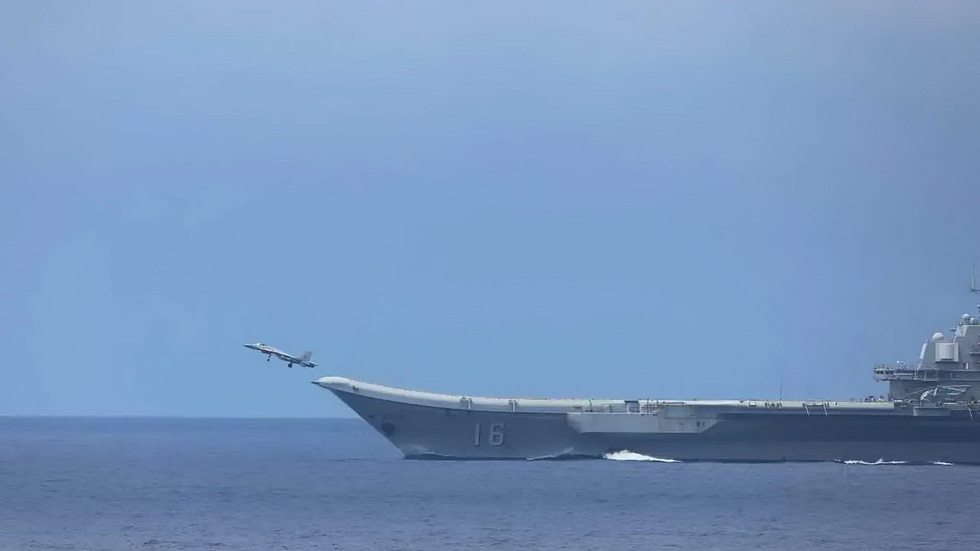 A Chinese carriers ski-jump bow the STOBAR ramp the baseline J-15 launches from.