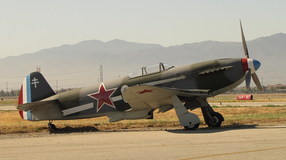 A Yak-3 warbird in Soviet markings the compact planform is clear in profile.