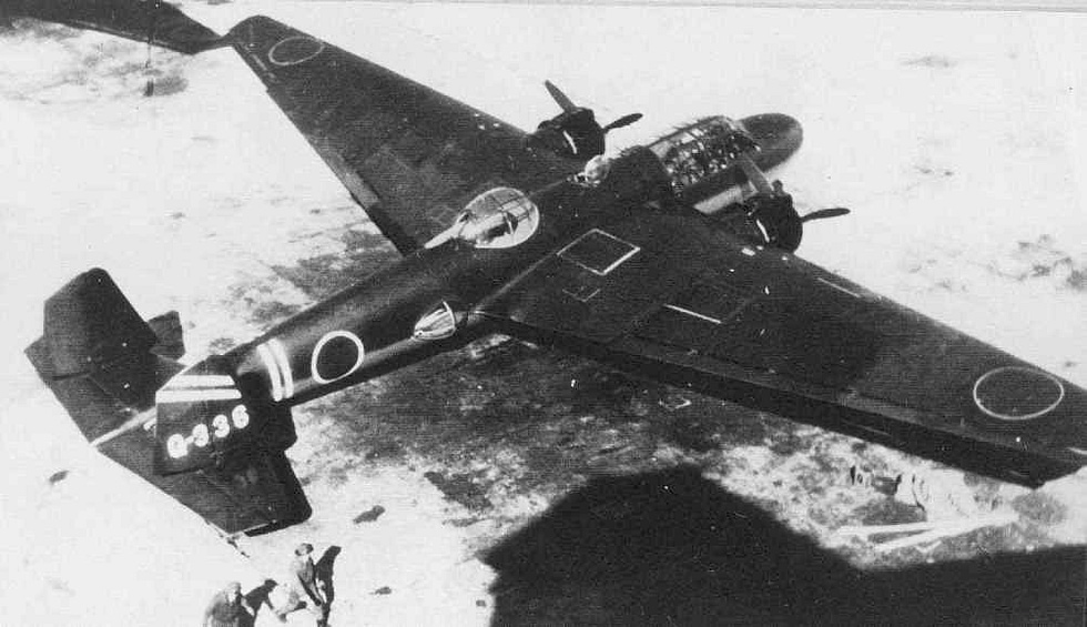 A Mitsubishi G3M Nell on the ground, front three-quarter, with hinomaru markings.
