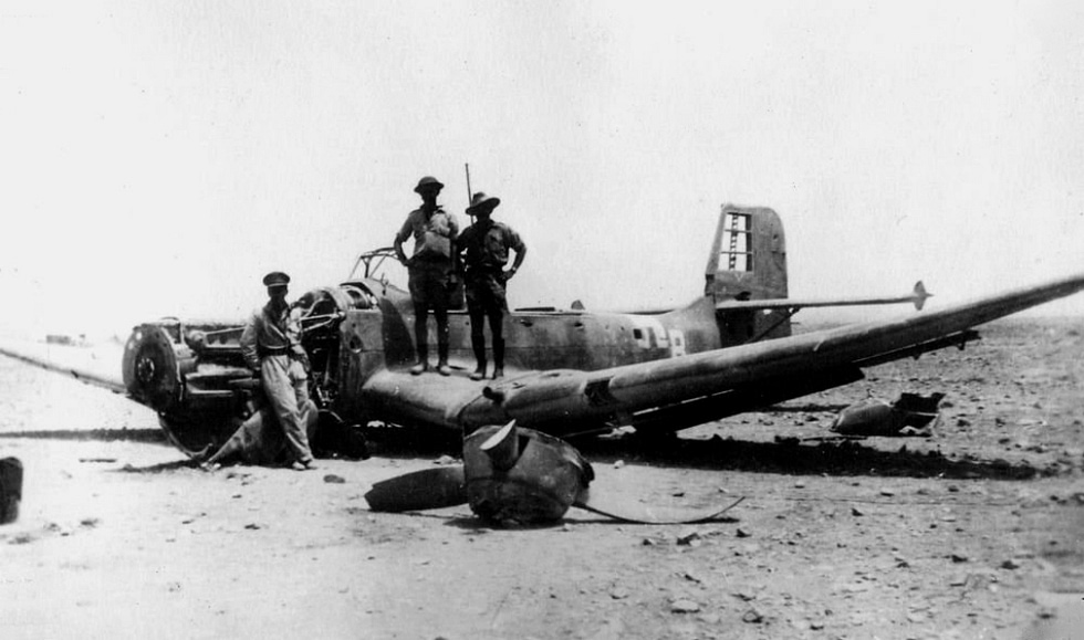 Troops and ground crew beside a Stuka, 1942 by now the type was increasingly vulnerable.