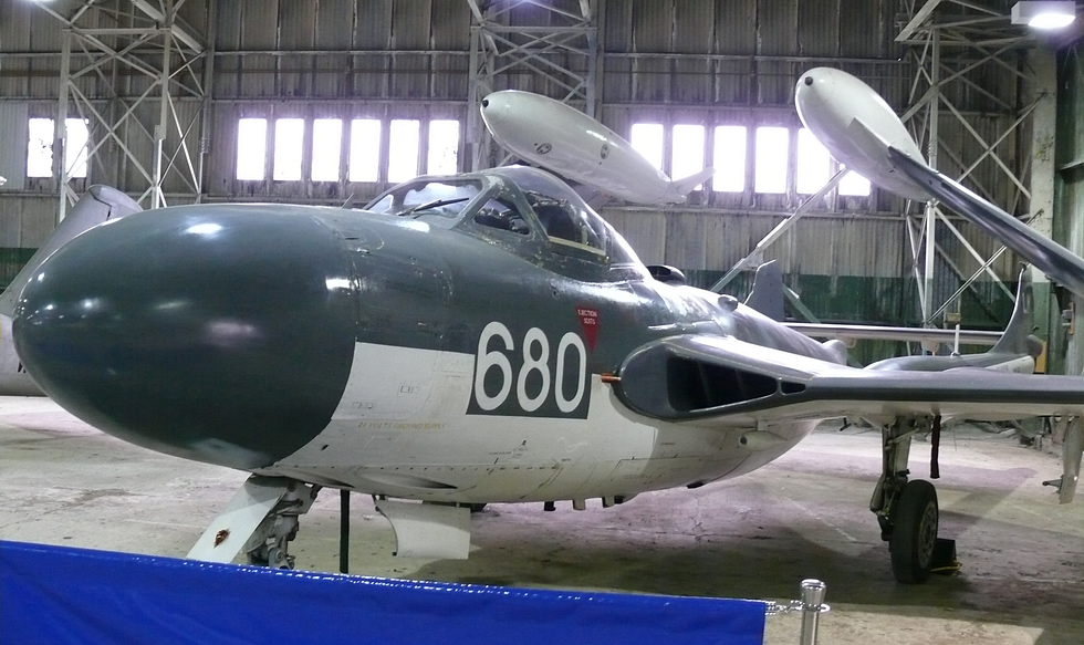 A preserved de Havilland Sea Venom in Fleet Air Arm markings at the Museum of Flight folding wings and a tailhook mark it as a naval jet.
