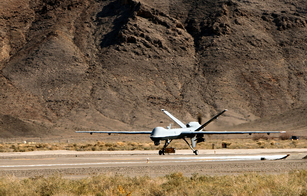 Airmen prepare an MQ-9 Reaper for launch the human end of an aircraft with no one aboard.
