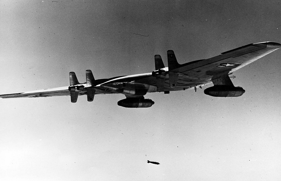 The YRB-49A reconnaissance variant drops a photo-flash bomb in flight.