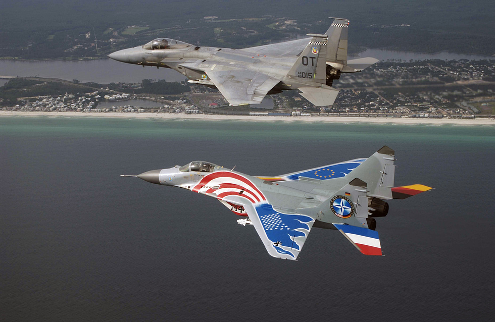 A German Luftwaffe MiG-29 formates with a USAF F-15C the type that shocked NATO after reunification.