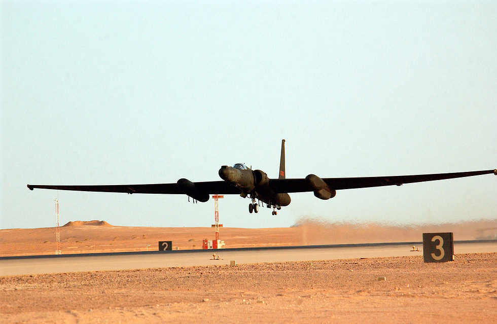 A U-2 climbing steeply after takeoff the glider wing hauls it toward the stratosphere.