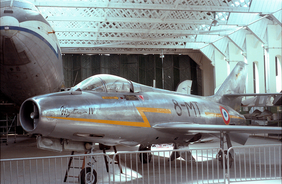 A preserved Mystre IV at Duxford the two 30 mm DEFA cannon ports visible in the nose.