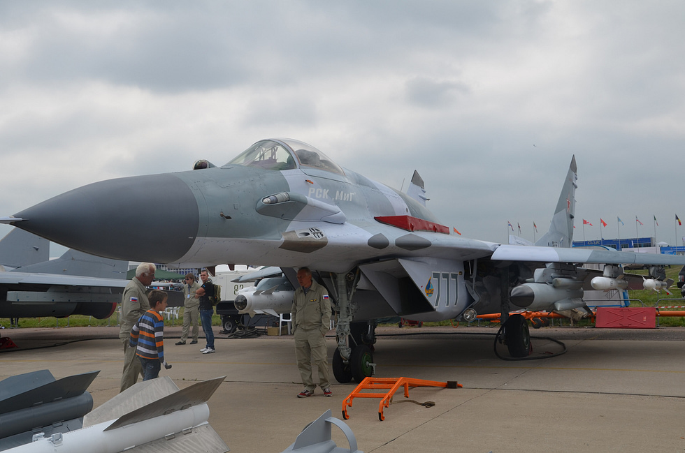 A MiG-29S in a high-alpha airshow pass the lift-body aerodynamics on display.