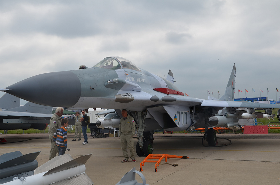 A MiG-29S in a high-alpha airshow pass the lift-body aerodynamics on display.