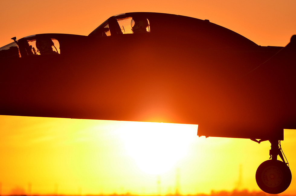 A U-2 Dragon Lady silhouetted at sunset seventy years and still on station.