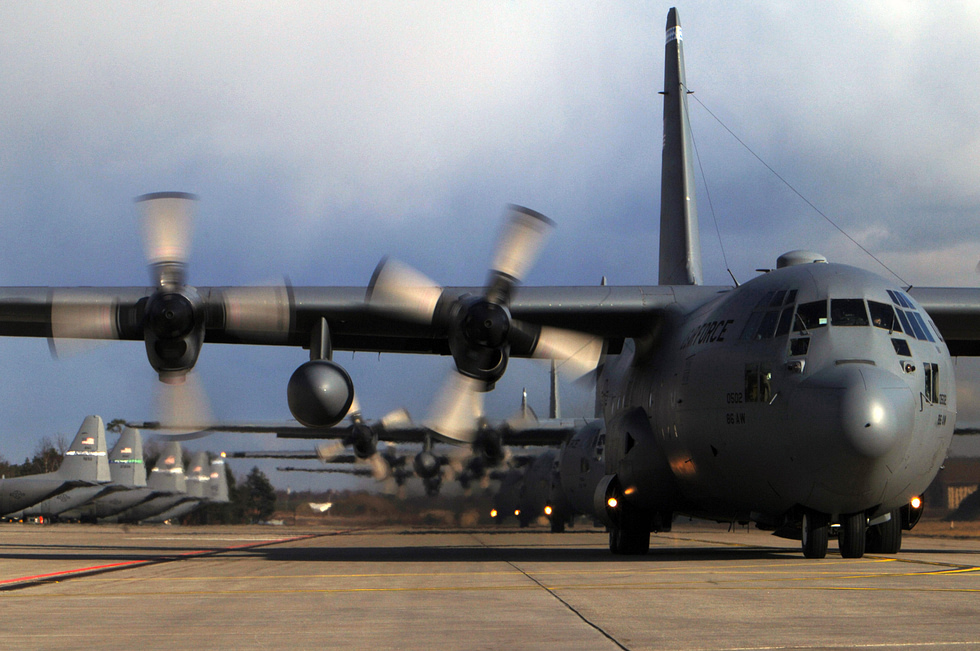 A Lockheed C-130 Hercules in flight the tactical airlifter that has served continuously since the 1950s.