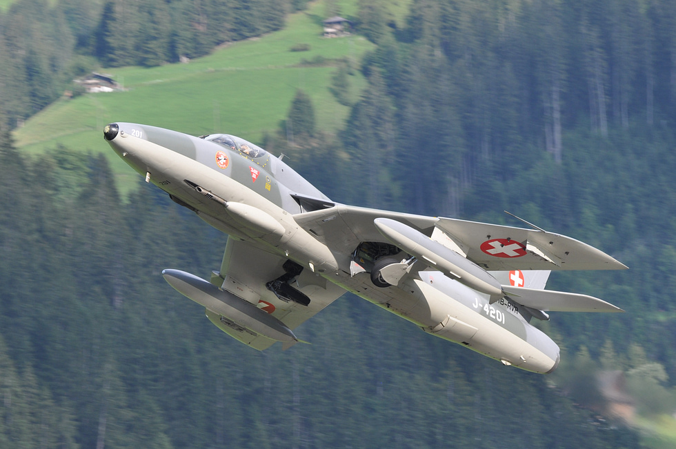 A Swiss Air Force Hawker Hunter banking in flight the type served Switzerland until 1994.