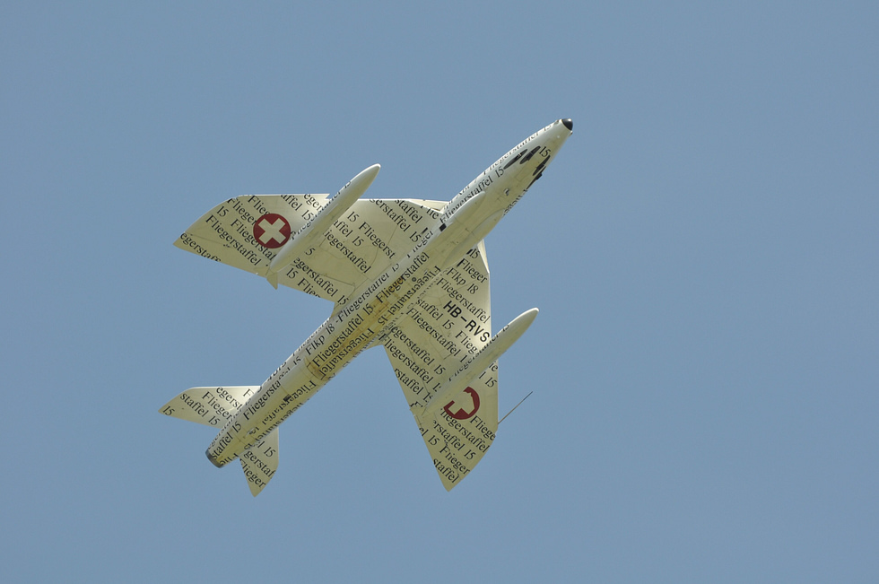 A Hunter seen from below, showing the clean swept wing and belly gun-pack fairings.