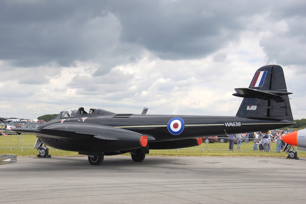 A Martin-Baker Meteor in flight among the oldest jets still flying, and still used to test ejection seats.