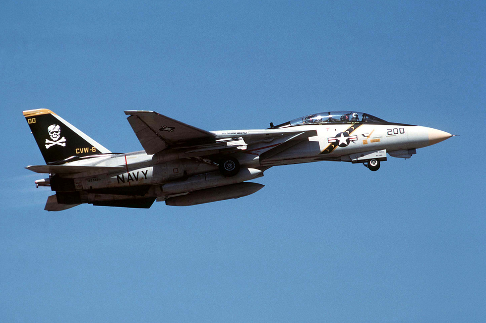 An F-14A of VF-84 taking off from NAS Oceana, wings spread.