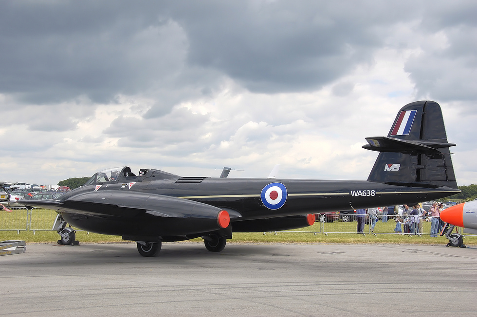 A Martin-Baker Meteor in flight among the oldest jets still flying, and still used to test ejection seats.