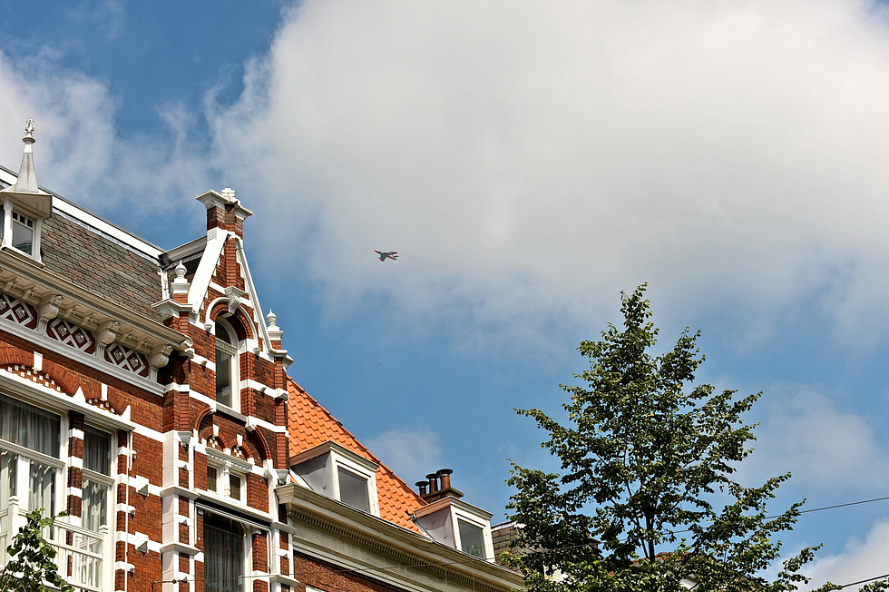 A preserved Hawker Hunter in a commemorative flypast.